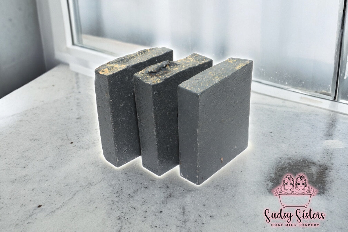Black Magic goat milk soap bar with cedar musk and rose by Sudsy Sisters