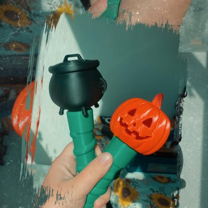 Halloween bath bomb wand fizzing in the bath