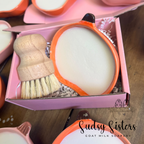 Solid dish soap in a ceramic dish by Sudsy Sisters